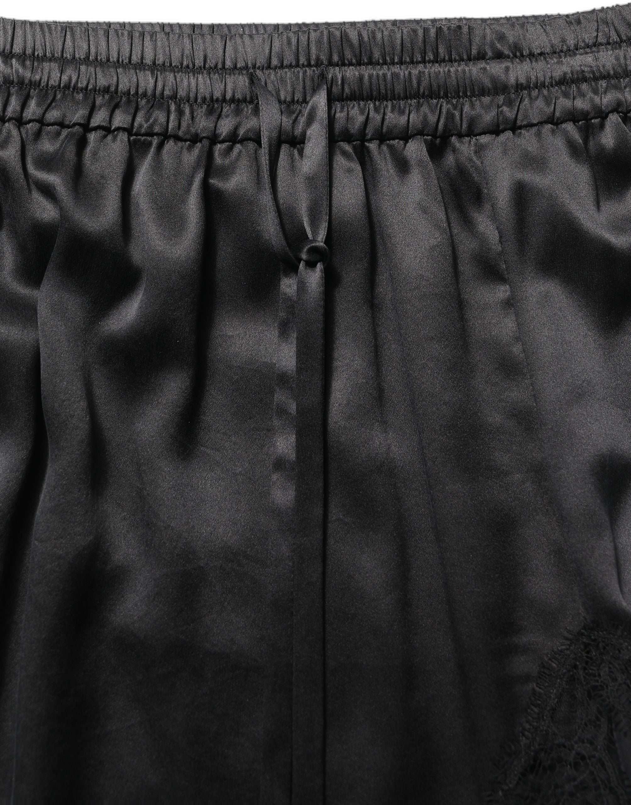 Dolce & Gabbana Schwarzer Satinrock mit Spitzendetails und seitlichem Schlitz-1