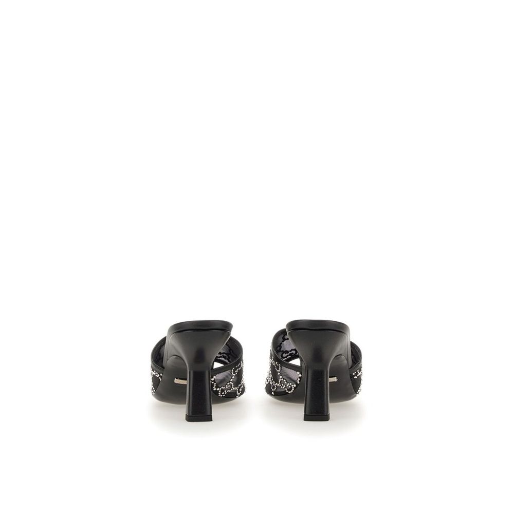 Gucci Schwarze Mules aus Polyamid-3