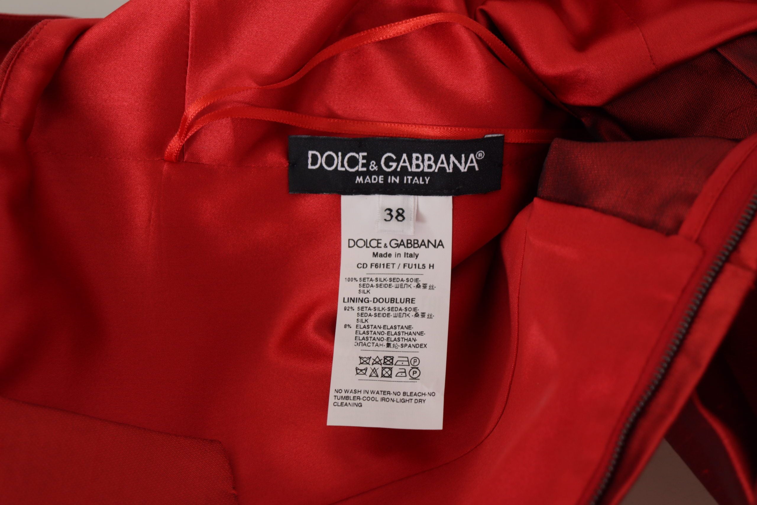Vestido rojo de corte A de Dolce & Gabbana en satén plisado y seda-6