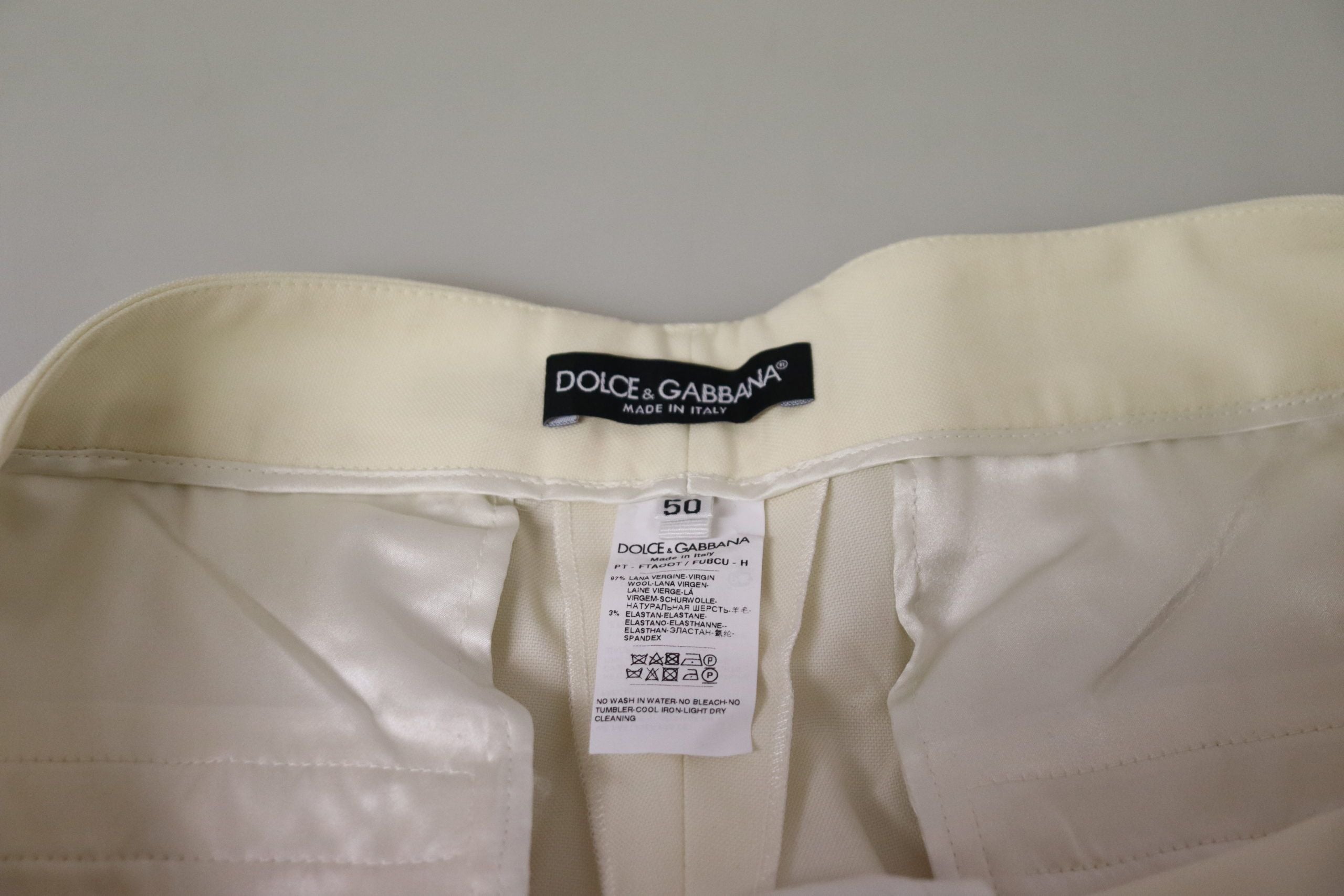 Pantalones de cintura alta color marfil con dobladillo vuelto de Dolce & Gabbana-6