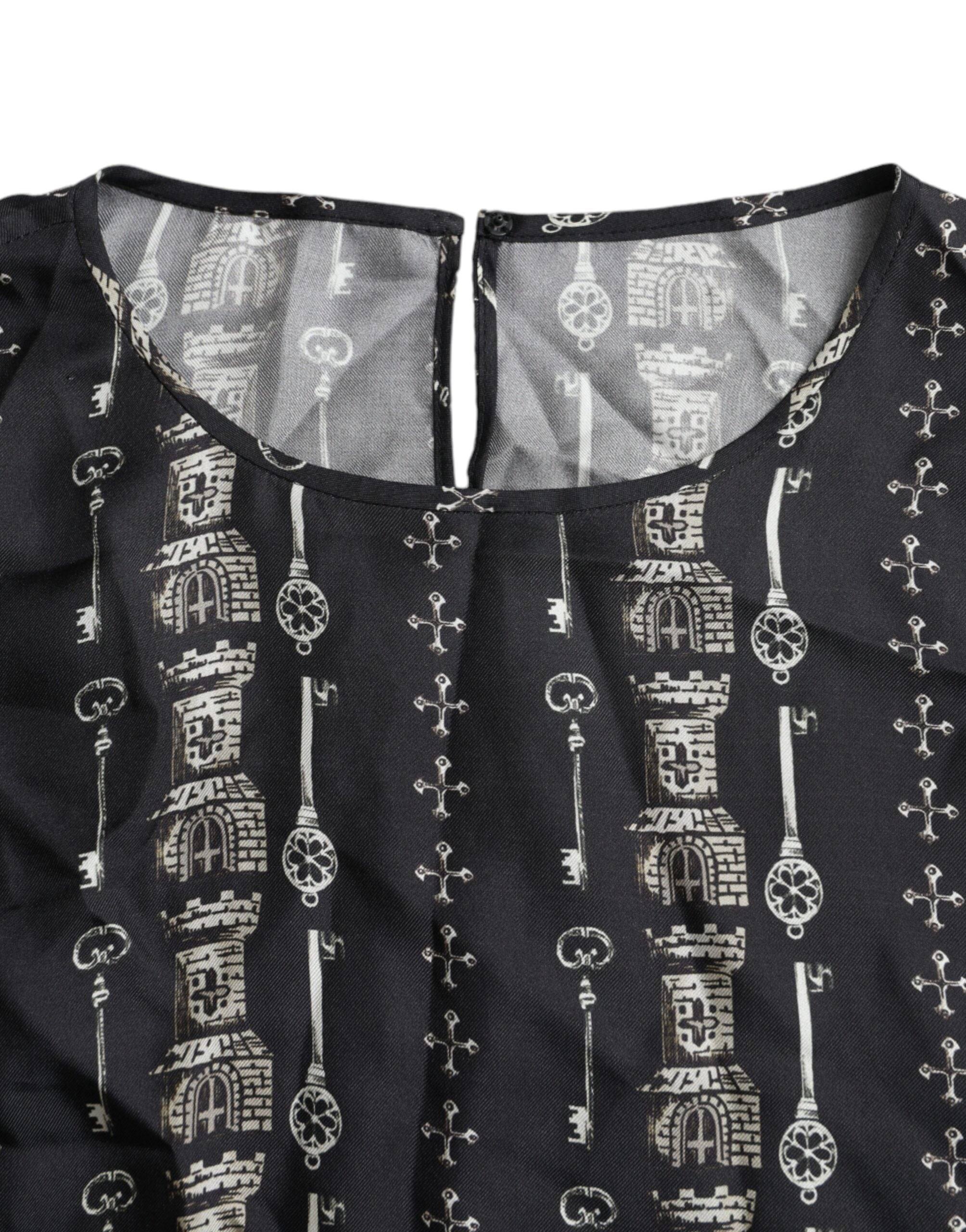 Blusa de seda negra con llavero de Dolce & Gabbana-6