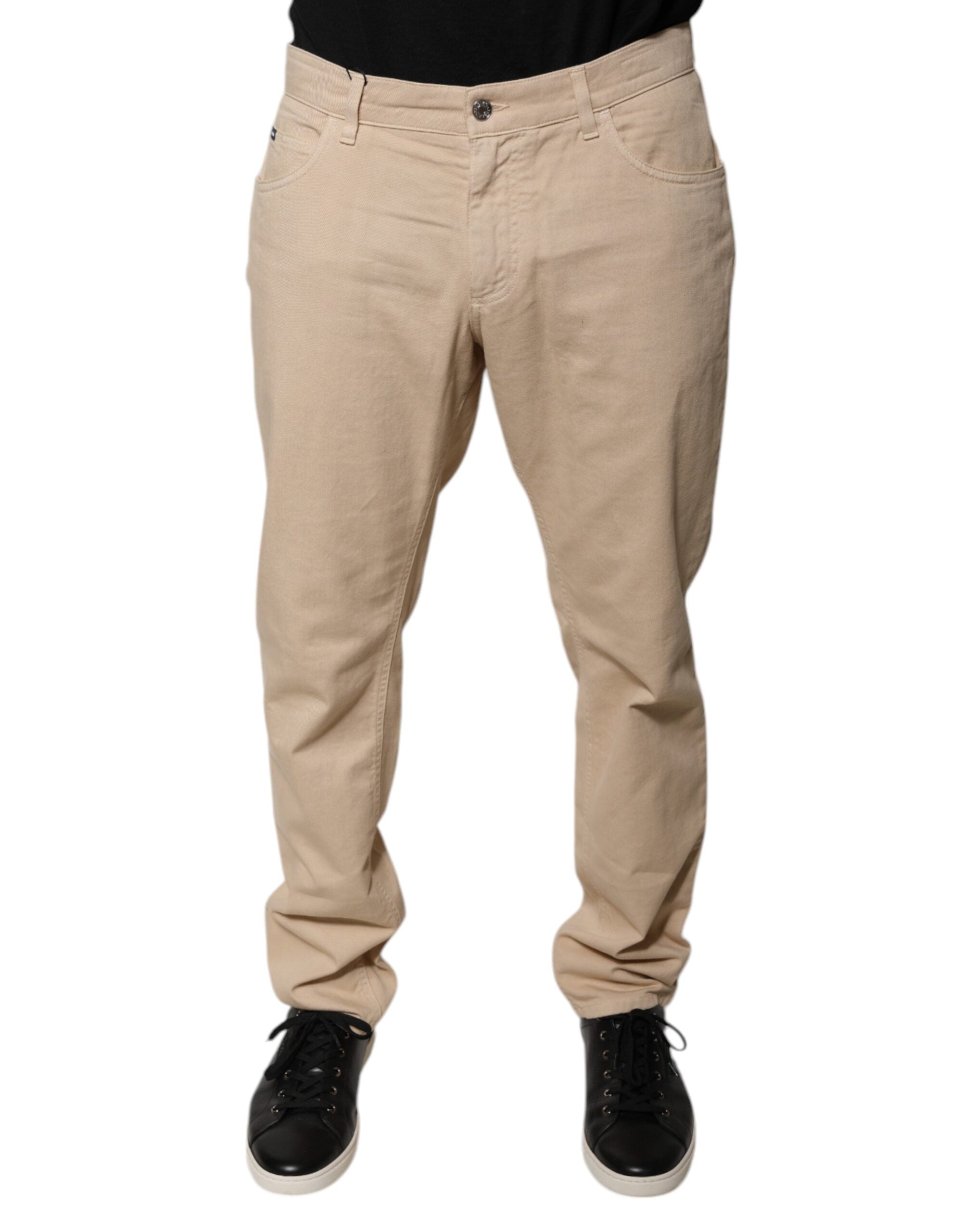 Vaqueros ajustados de talle medio de algodón beige de Dolce & Gabbana-1