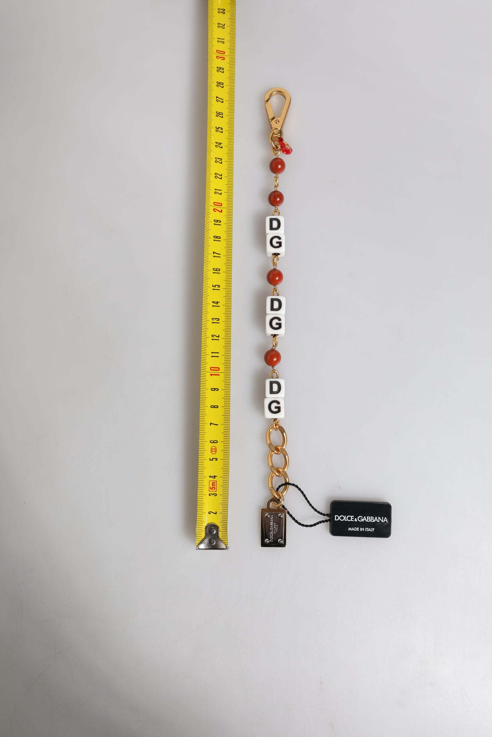 Pulsera Dolce & Gabbana con cadena de latón dorado multicolor y logotipo DG en forma de cubo-3