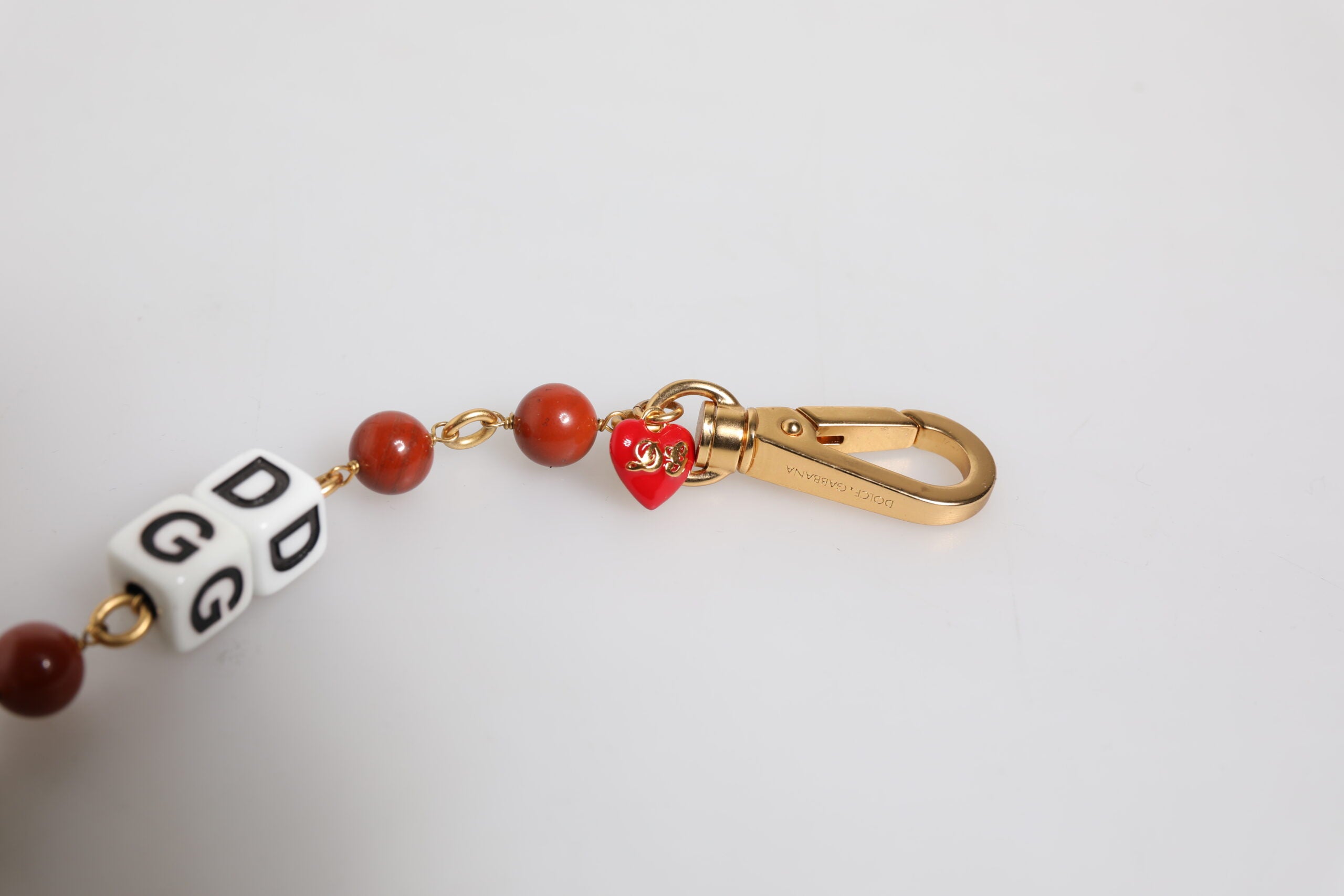 Pulsera Dolce & Gabbana con cadena de latón dorado multicolor y logotipo DG en forma de cubo-5
