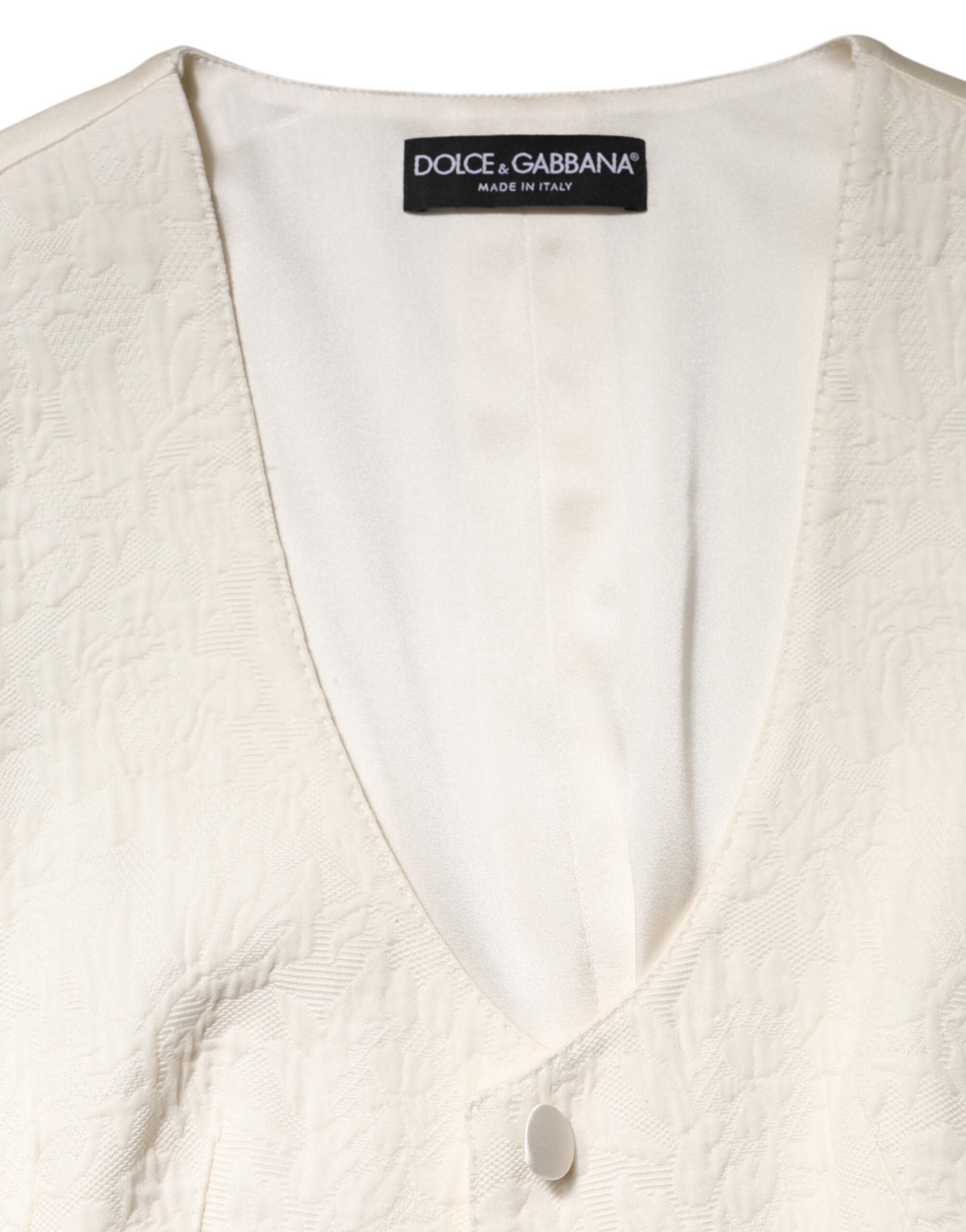 Top sin mangas de algodón color marfil con tapeta de botones de Dolce & Gabbana-7