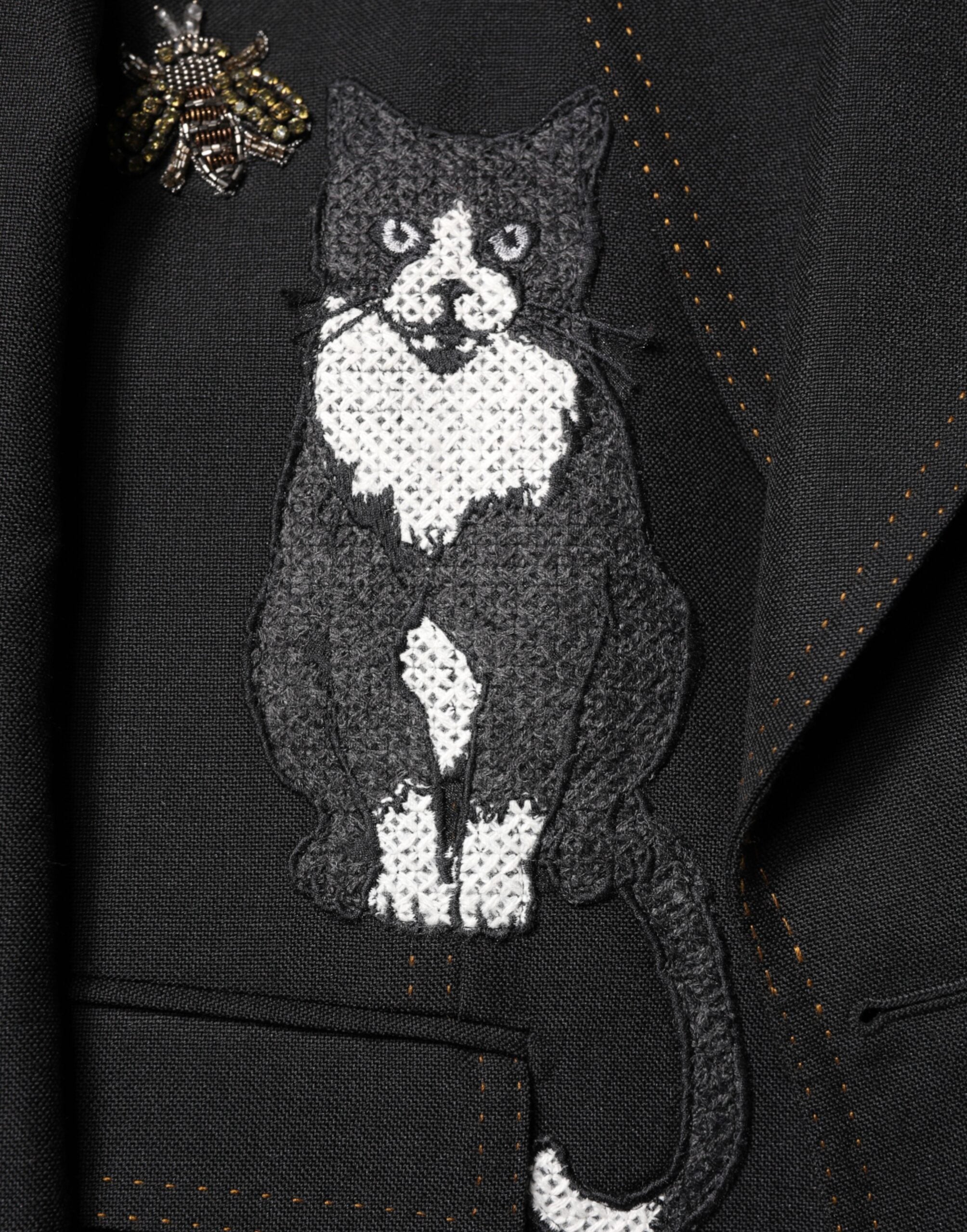 Abrigo de traje negro con corona de abeja y blazer de Dolce & Gabbana-7