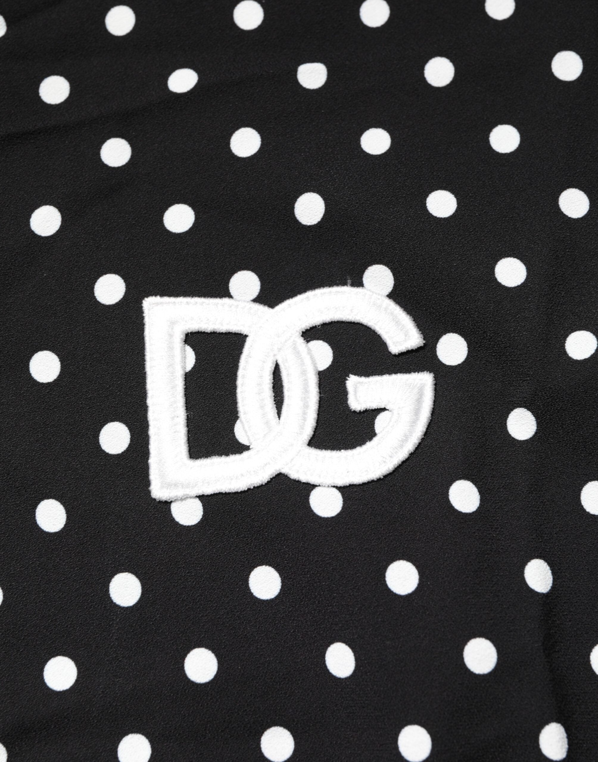 Dolce & Gabbana Schwarzes gepunktetes Polo-T-Shirt mit kurzen Ärmeln und Kragen-8