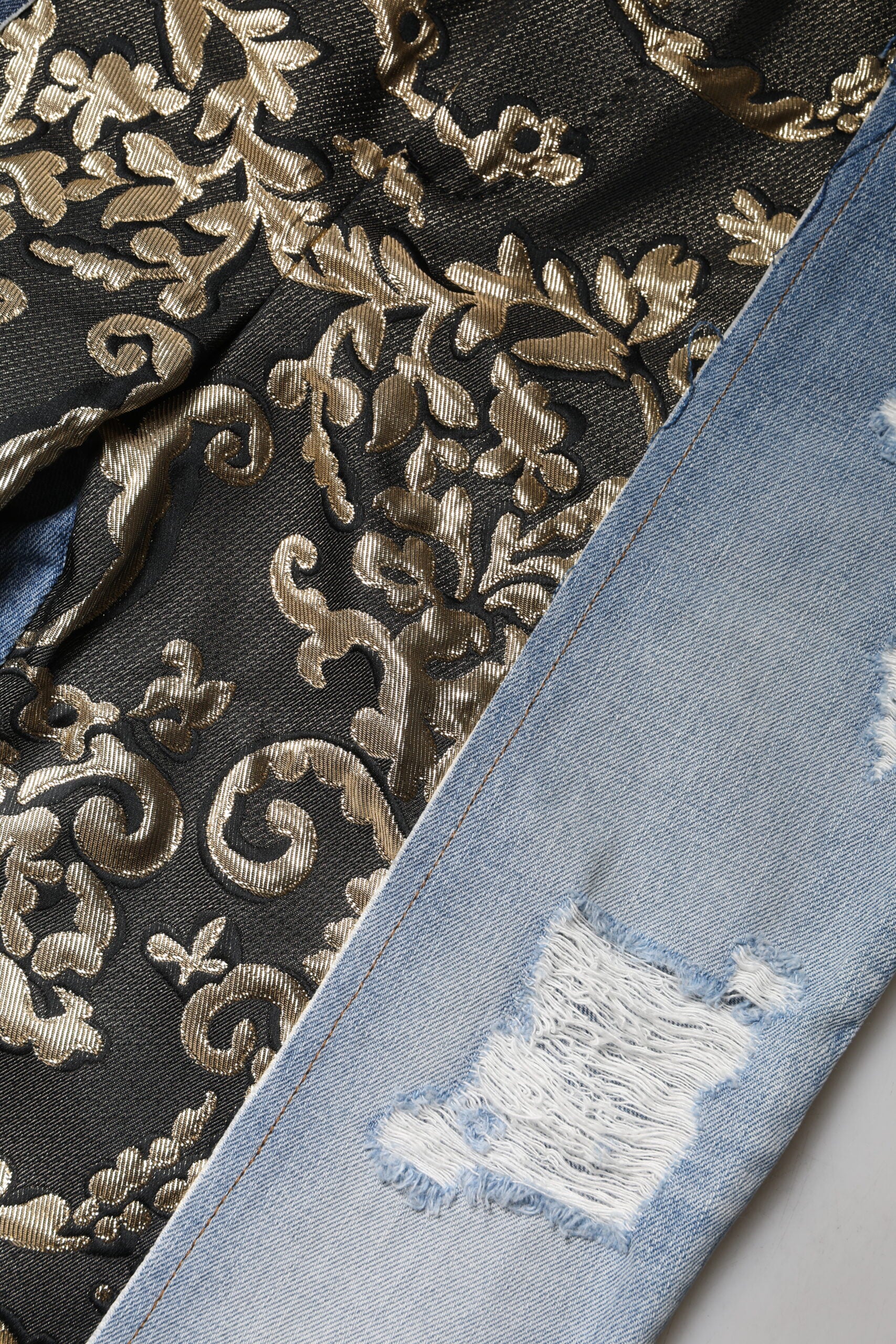 Dolce & Gabbana Mehrfarbige konisch zulaufende Denim-Jeans mit Patchwork-7