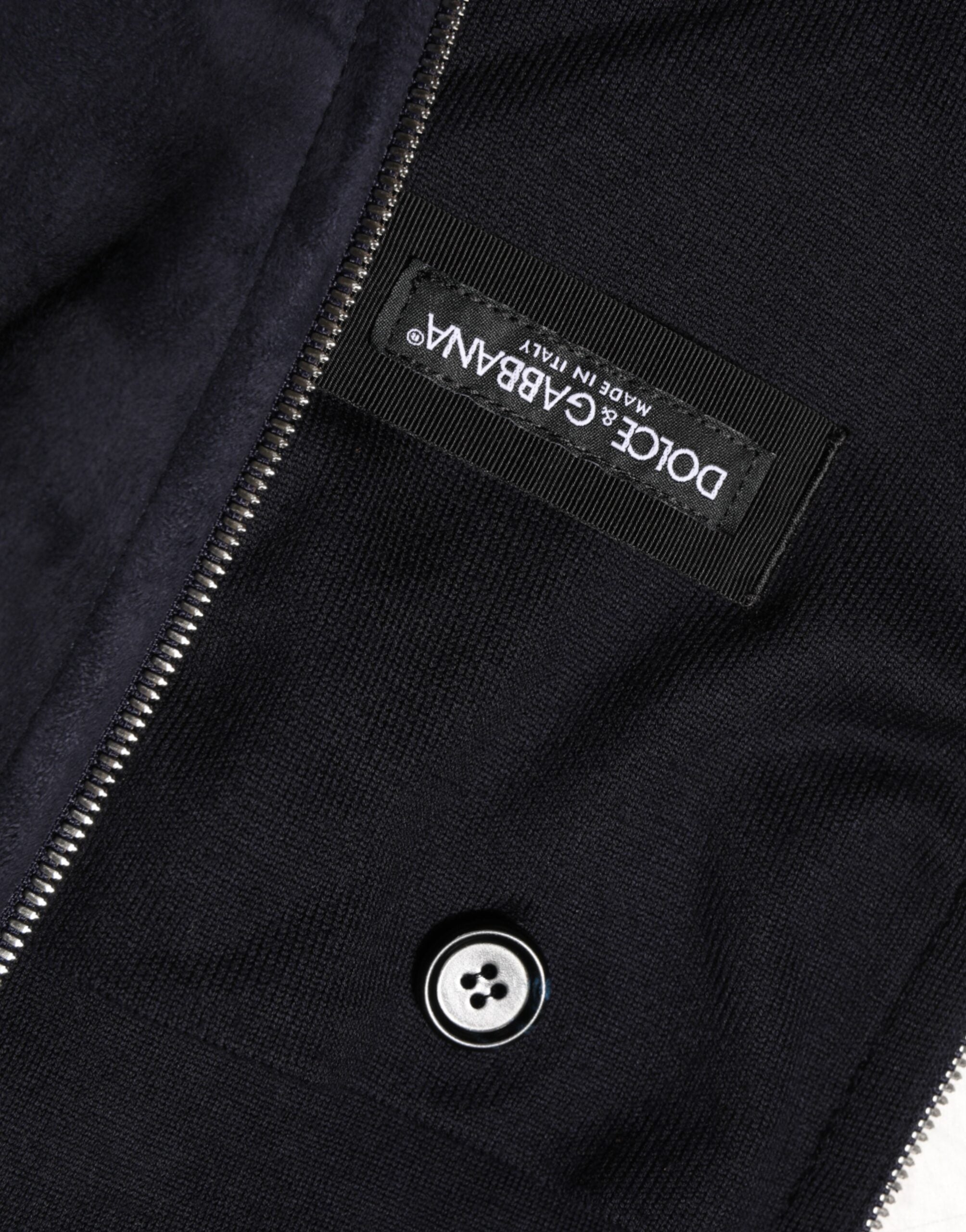 Chaqueta blusón de piel negra con capucha y cremallera de Dolce & Gabbana-7