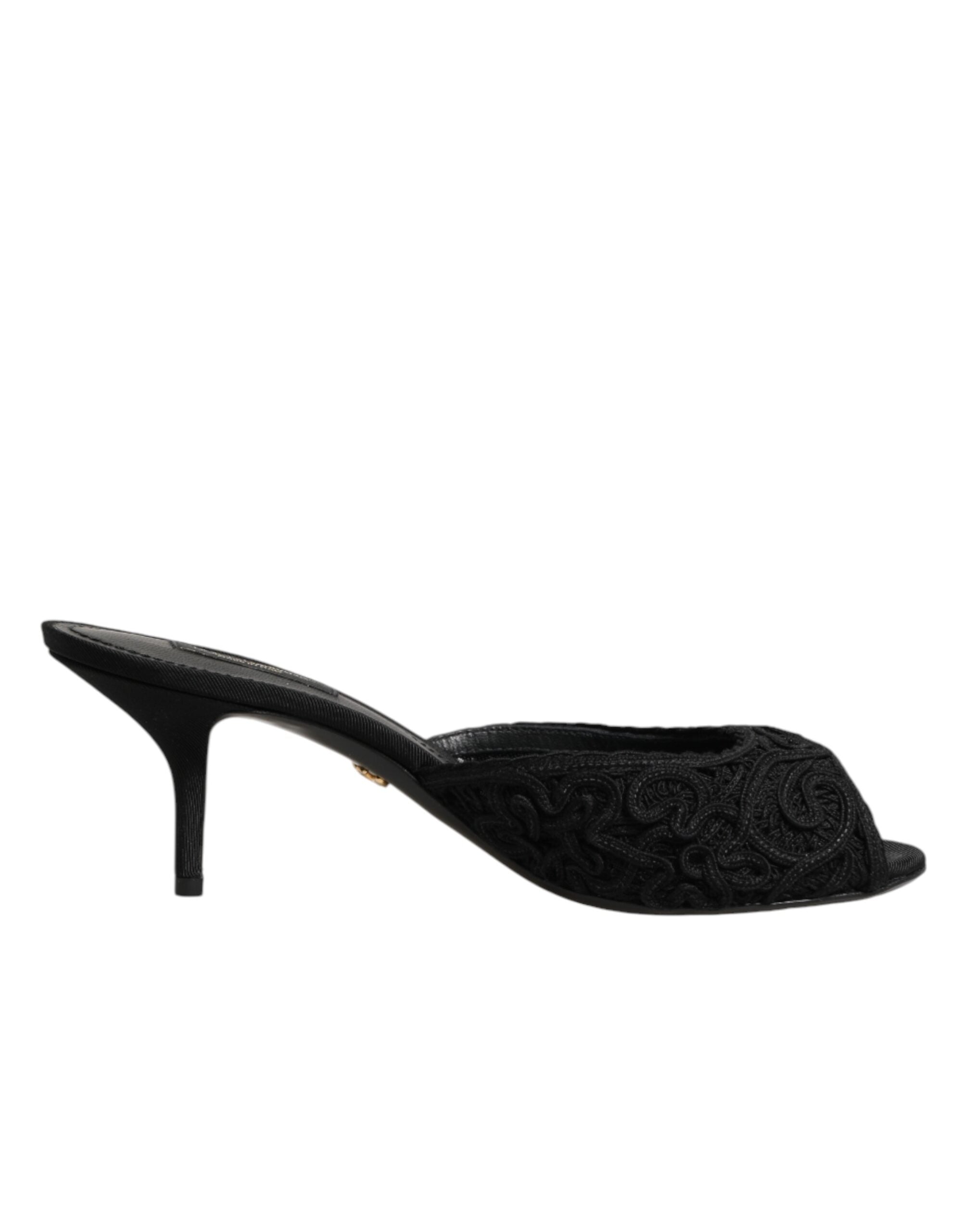 Mules sin cordones con tacón y bordados negros de Dolce & Gabbana-1